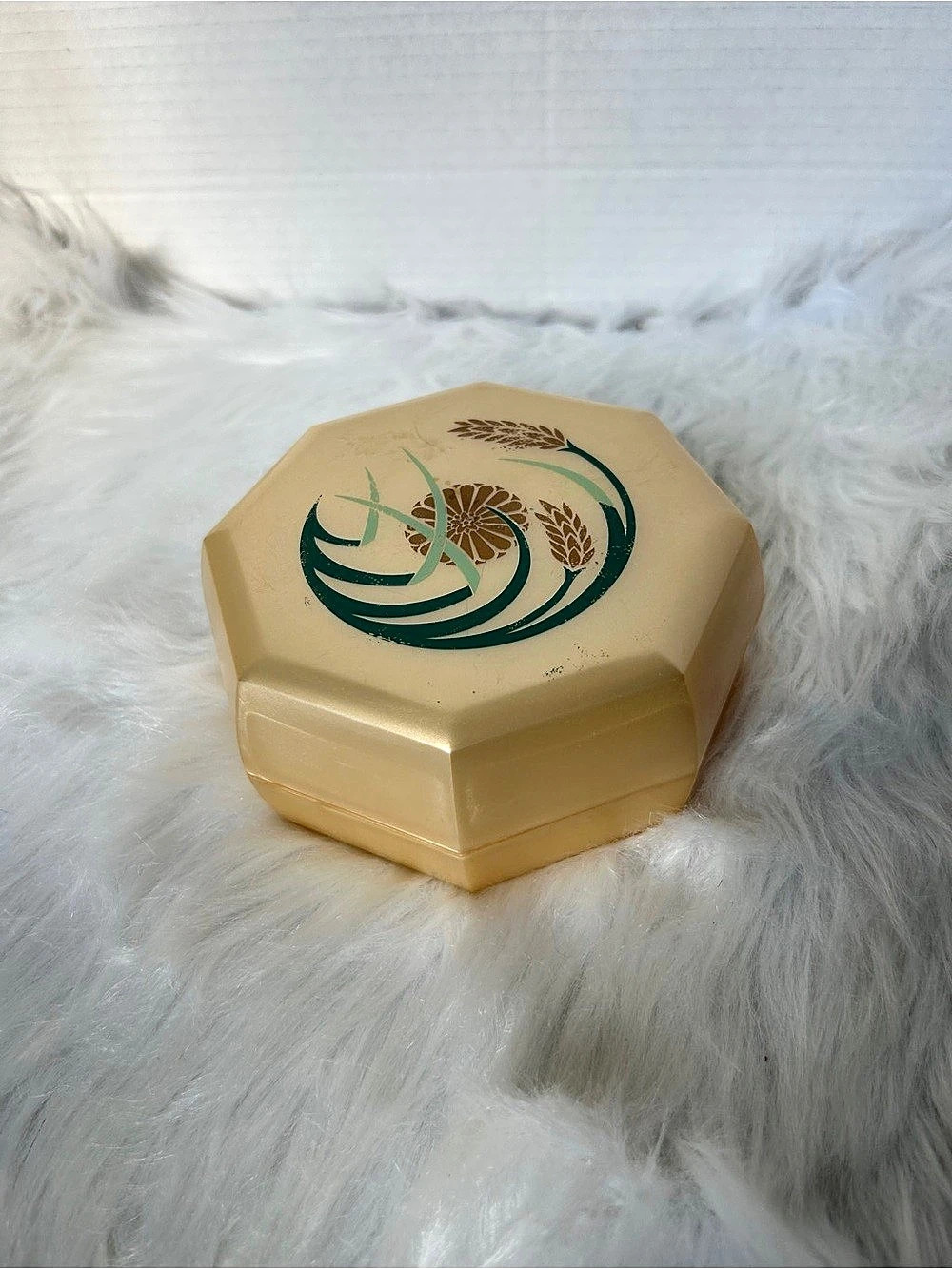 Empty Dusting Powder container.
Gold Octagonal Floral Decor
